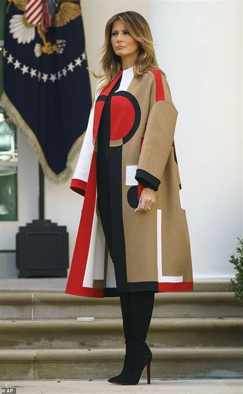 dior coat melania|Melania Trump wears head.